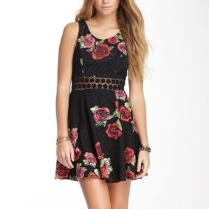FREE PEOPLE BLACK ROSE DAISY CUTOUT DRESS.